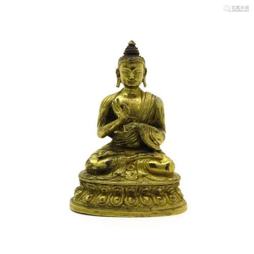 A Bronze Buddha Sculpture Depicting seated Buddha,...