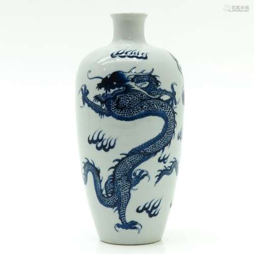 A Blue and White Dragon Vase Depicting dragons and...