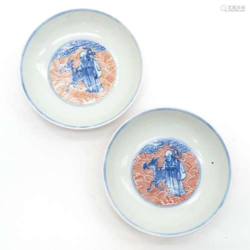 A Pair of Polychrome Decor Plates In orange and bl...