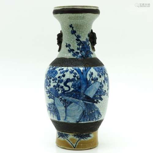 A Nanking Vase White crackleware background with b...