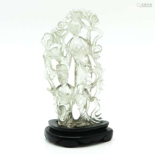 A Carved Rock Crystal Sculpture on Wood Base Depic...