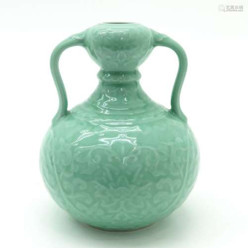 A Celadon Monochrome Vase Raised flor decor, marke...