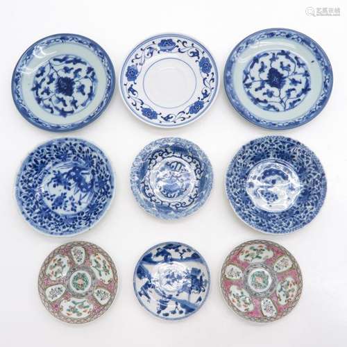 A Diverse Lot of 9 Saucers In diverse decors and s...