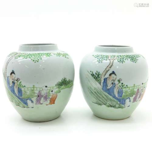 A Pair of Polychrome Decor Vases Depicting man in ...