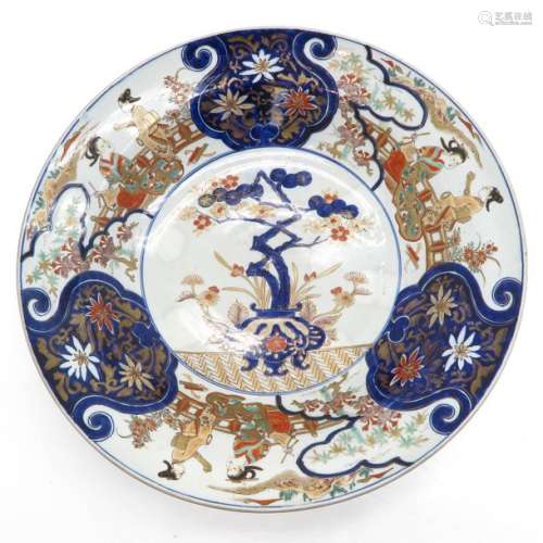 A Polychrome Decor Charger Depicting Chinese ladie...