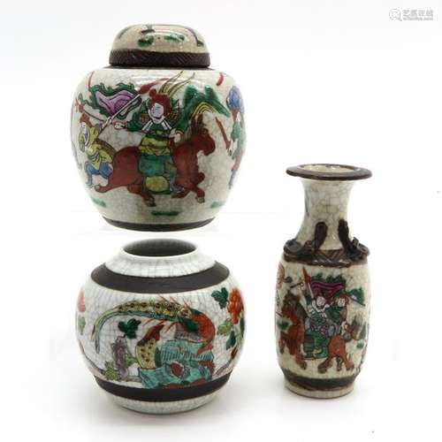 A Nanking Ginger Jar and 2 Vases Depicting warrior...