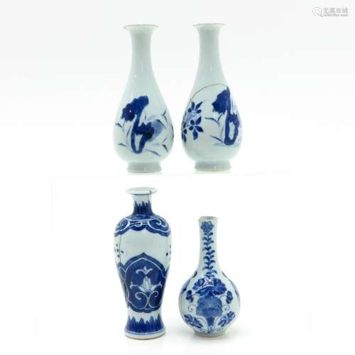 A Lot of 4 Small Blue and White Decorated Vases Fl...