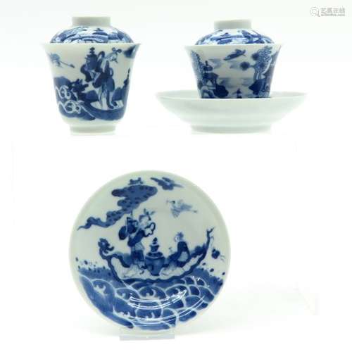 A Pair of Blue and White Decorated Covered Cups an...