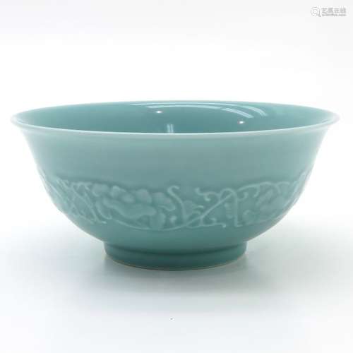 A Celadon Bowl Raised floral decor surrounding bow...