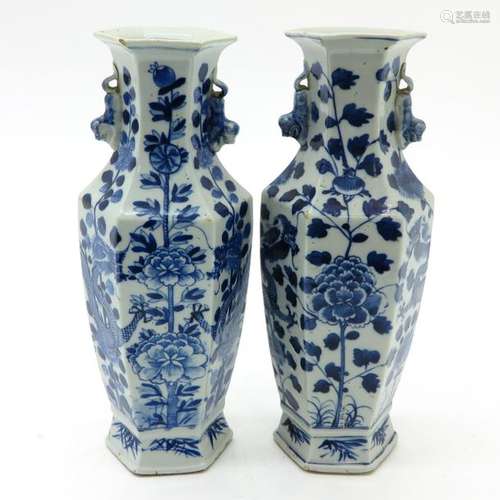 A Pair of Blue and White Vases Floral and dragon d...