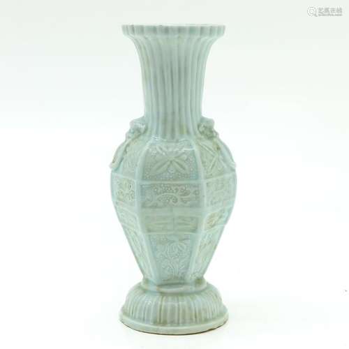 A Celadon Vase Raised foral decor, 27 cm. Tall.		...