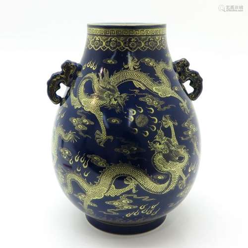 A Blue and Gilt Decor Vase Blue ground with gilt d...