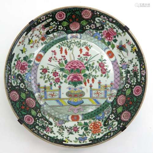 A Large Polychrome Decor Plate Depicting florals a...