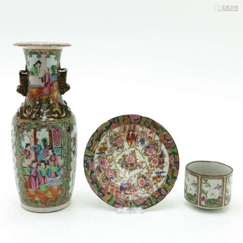 A Cantonese Vase and Cup and Saucer Vase is 26 cm....