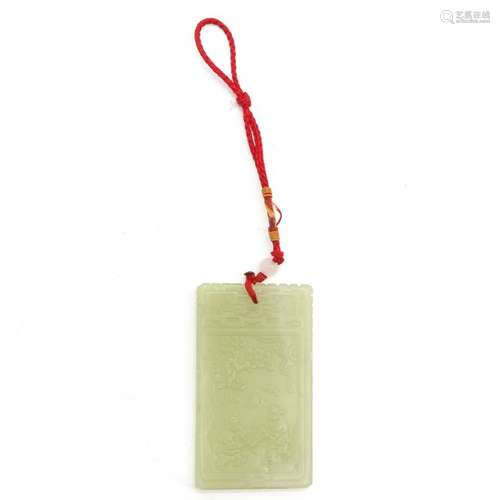 A Carved Jade Pendant Depicting Chinese text, 7 x ...