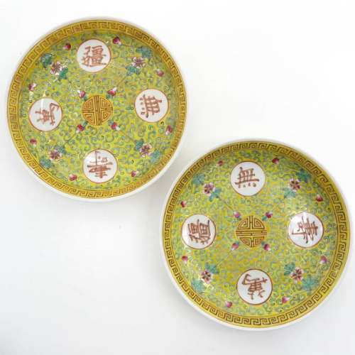 A Pair of Polychrome Decor Plates Yellow ground wi...