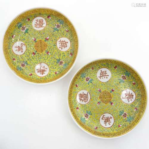 A Pair of Polychrome Decor Plates Yellow ground wi...