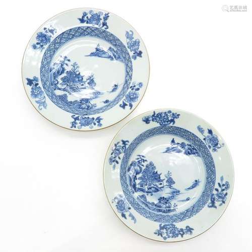 A Pair of Blue and White Plates Depicting landscap...