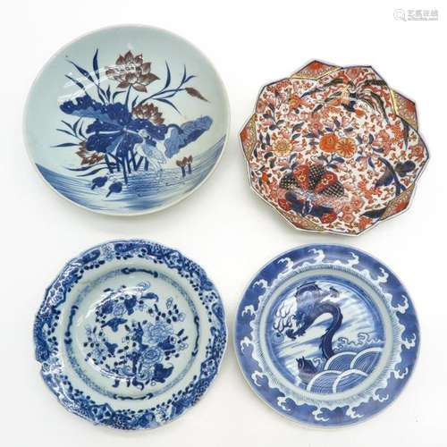 A Lot of 4 Plates In diverse decors, largest plate...