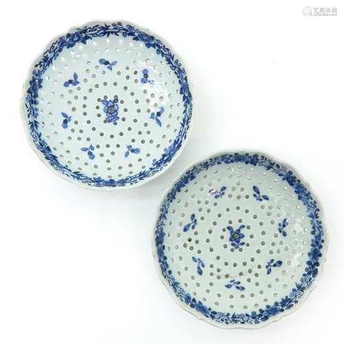 A Pair of Blue and White Strainers Floral decor, 2...