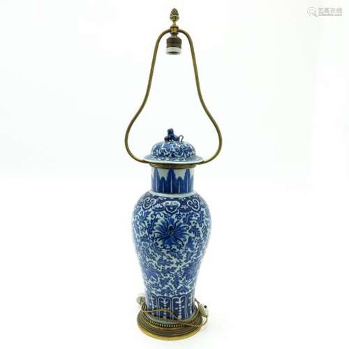 A Blue and White Lamp Floral decor with cover depi...