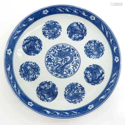 A Large Blue and White Charger Depicting phoenix a...