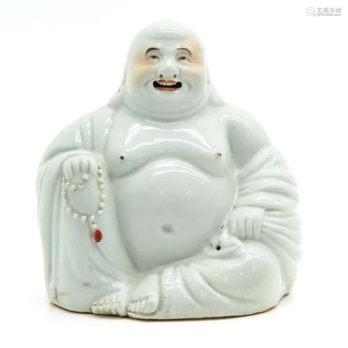 A Porcelain Buddha Sculpture Depicting seated Budd...