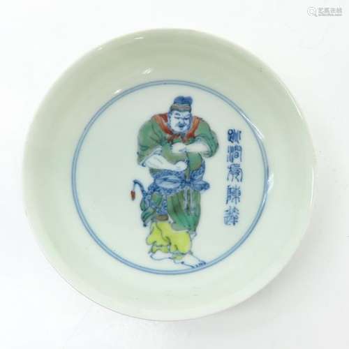 A Doucai Decor Plate Depicting Chinese man, marked...