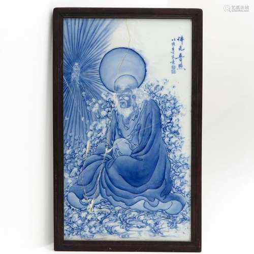 A Framed Blue and White Tile Depicting Chinese Imm...