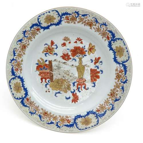 A Polychrome Gilt Decor Plate Depicting flowers in...