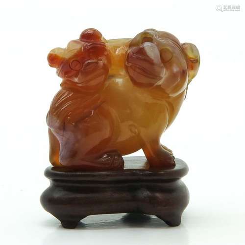 A Carved Jade Sculpture on Wood Base Depicting 2 t...