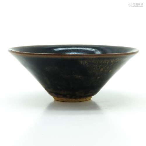 A Brown Glaze Tea Bowl 12 cm. In diameter.		A Bro...