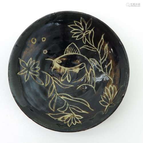 A Black Glaze Bowl On small circular foot, 15 cm. ...