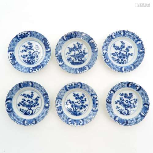 A Series of 6 Blue and White Decorated Saucers Flo...