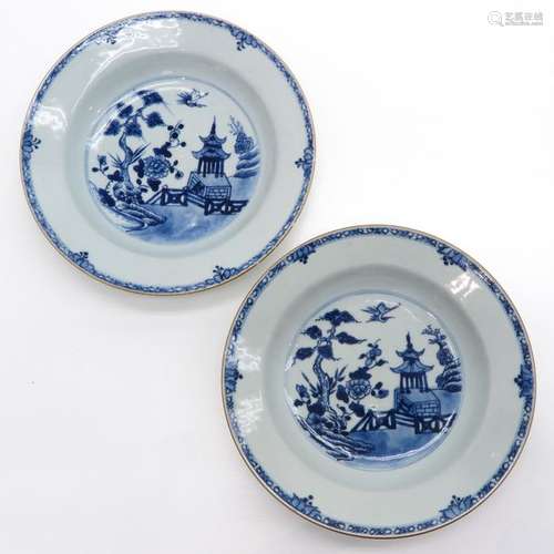 A Pair of Blue and White Pagoda Plates In landscap...