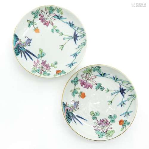 A Pair of Polychrome Plates Floral decor, marked o...