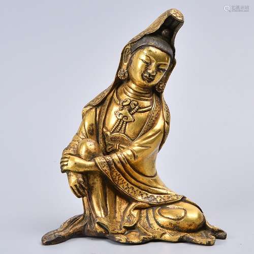 A GILT-BRONZE FIGURE OF GUANYIN