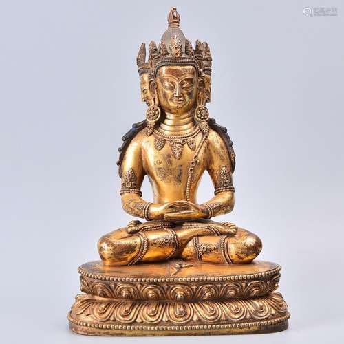 A GILT-BRONZE FIGURE OF USHRISHVJAYA