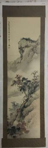 A CHINESE SCROLL PAINTING OF LANDSCAPE