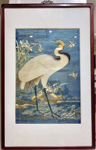 AN EMBROIDERY OF CRANE