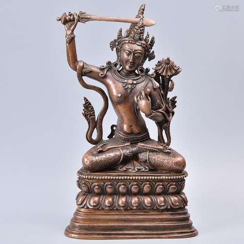 A BRONZE FIGURE OF MANJUSHRI