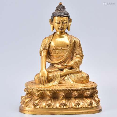 A GILT-BRONZE FIGURE OF BUDDHA