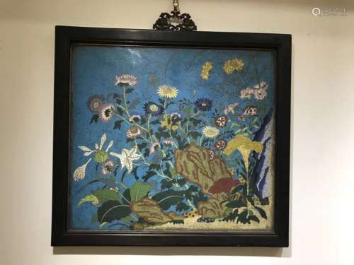 A CLOISONNE WALL PLAQUE, FRAMED