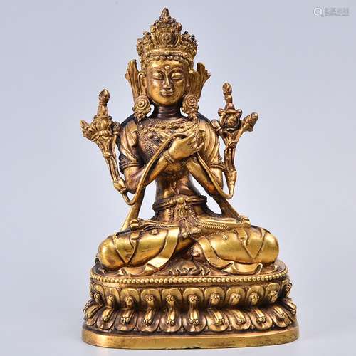 A GILT-BRONZE FIGURE OF MAJUSHRI