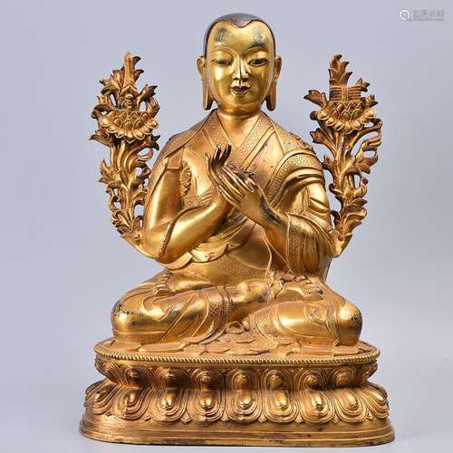 A GILT-BRONZE FIGURE OF BUDDHA