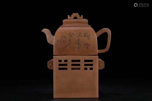 A ZISHA TEAPOT AND HOLDER