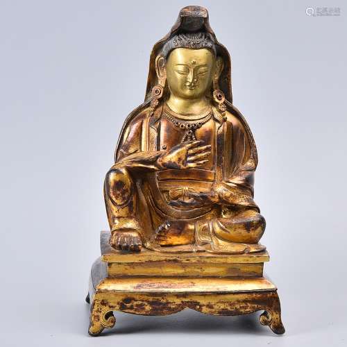 A GILT-BRONZE FIGURE OF GUANYIN