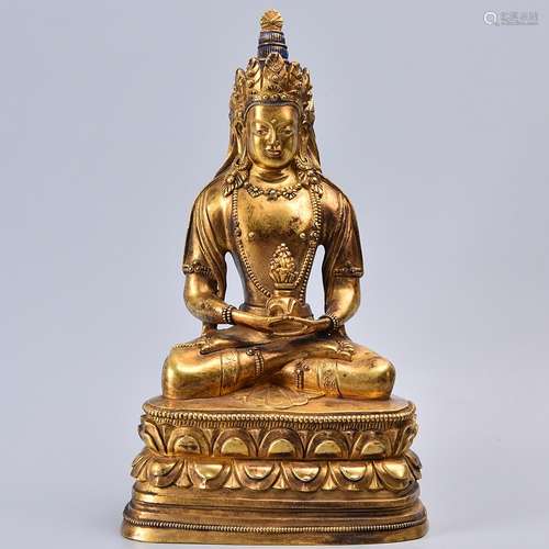 A GILT-BRONZE FIGURE OF AMITAYUS