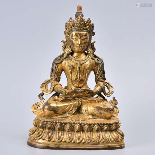 A GILT-BRONZE FIGURE OF BODHISATTVA