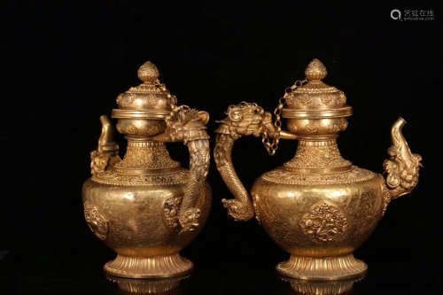 18TH CENTURY, A PAIR OF TIBETAN GILT BRONZE POTS